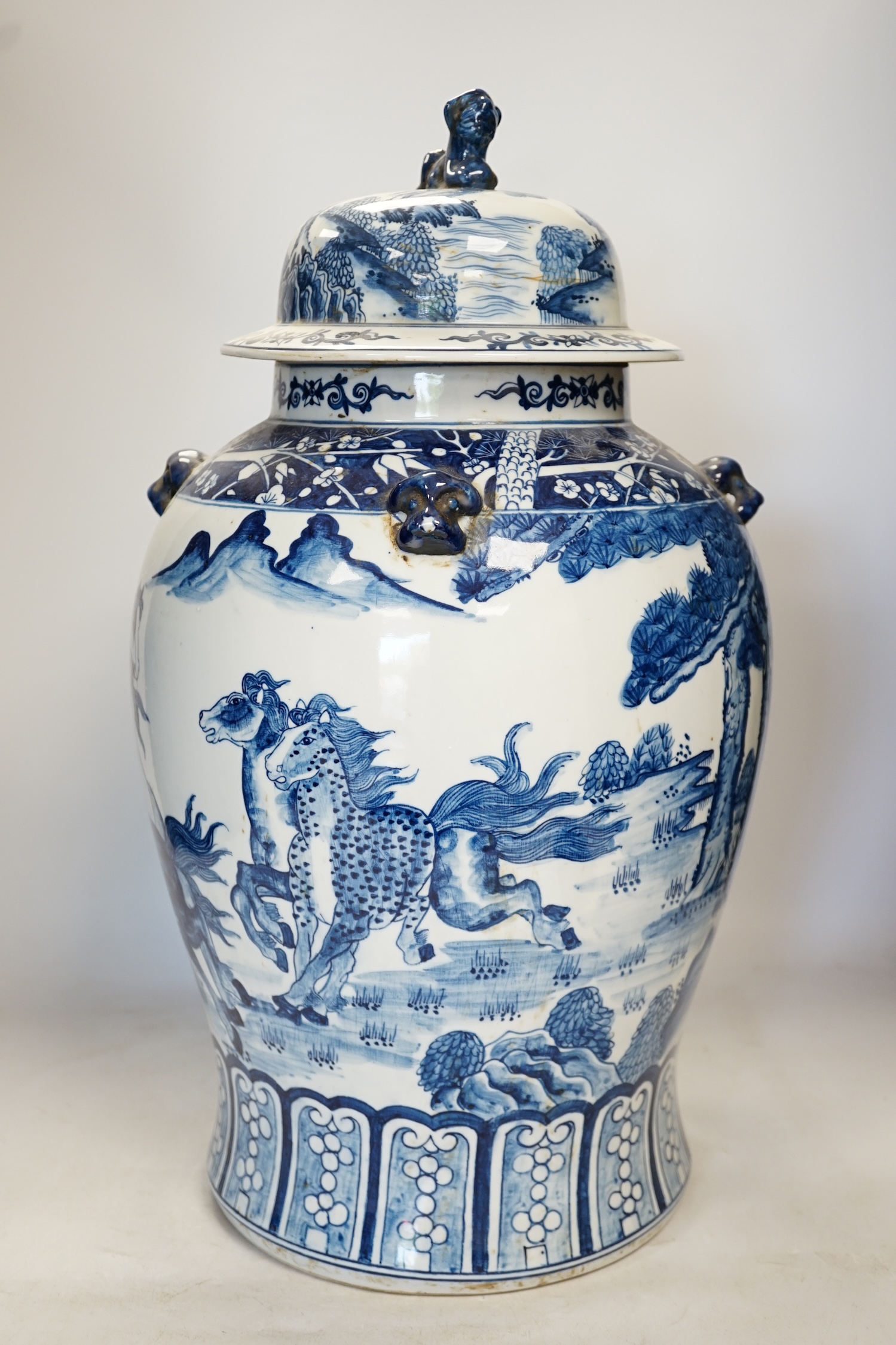 A large Chinese blue and white jar and cover, 50cm high. Condition - fair